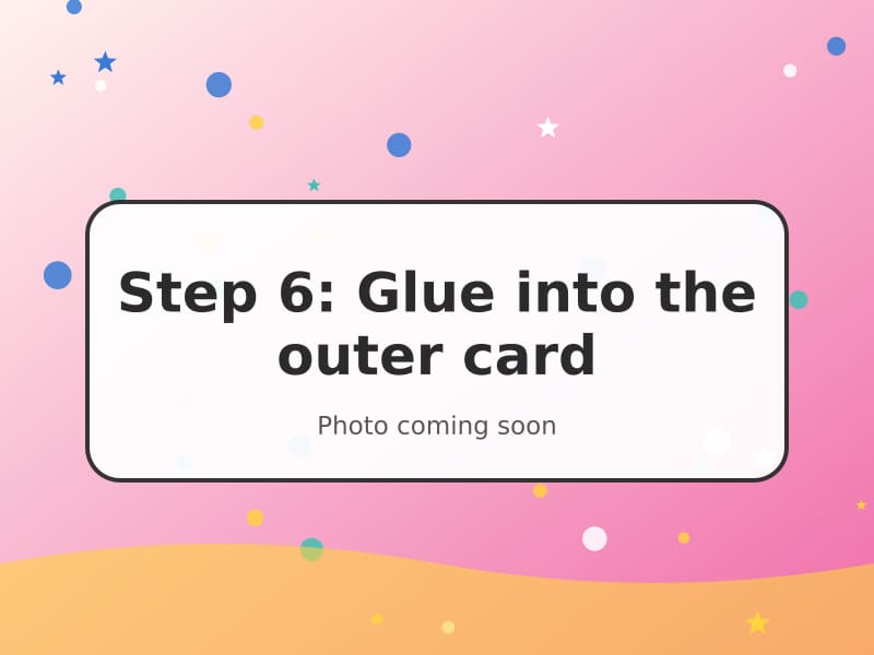 The pop-up insert being glued inside a pink outer card